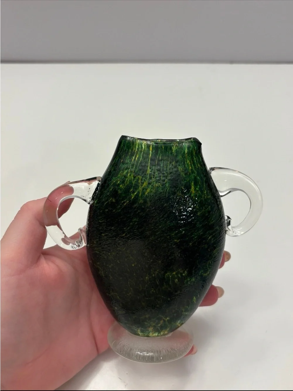 vintage glass vase from Osaka features a dark green, speckled design